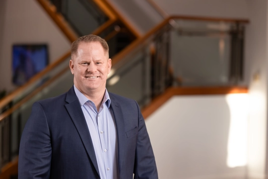 smiling person in business attire